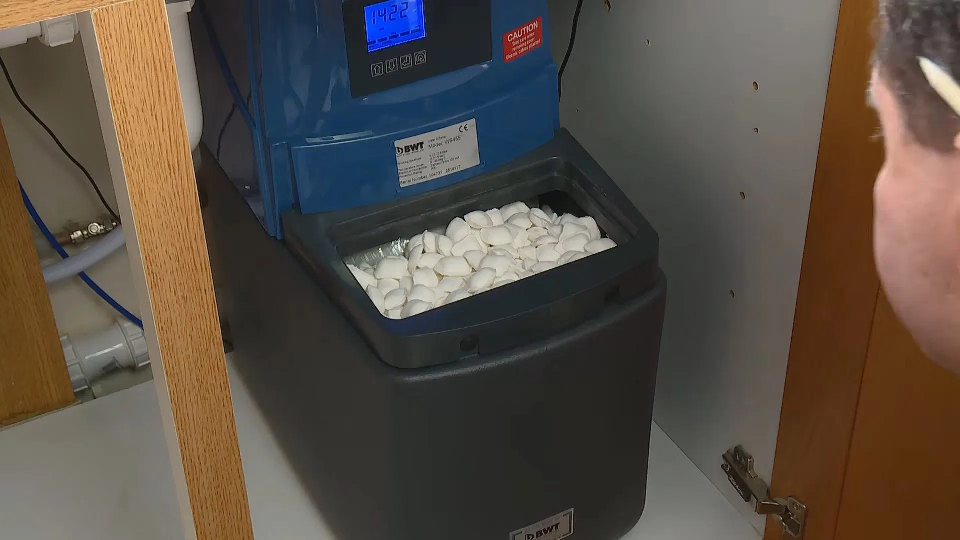 Adding Salt To Water Softener Brine Tank shown for City Water or Well Water: What Actually Needs Filtering in Paulding County? in Dallas, Georgia.
