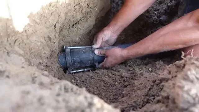 Aligning Water Pipe Repair Sleeve shown for Water Heater Repair in Dallas, GA in Dallas, Georgia.
