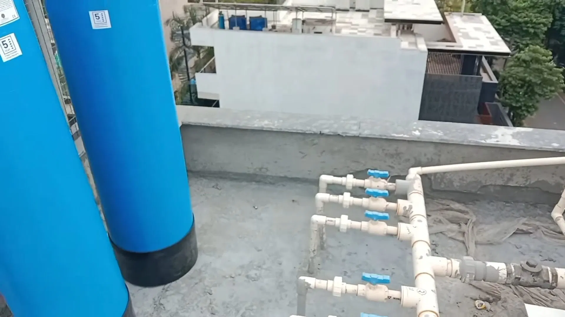 Blue Water Softener Installed By Wall shown for City Water or Well Water: What Actually Needs Filtering in Paulding County? in Dallas, Georgia.
