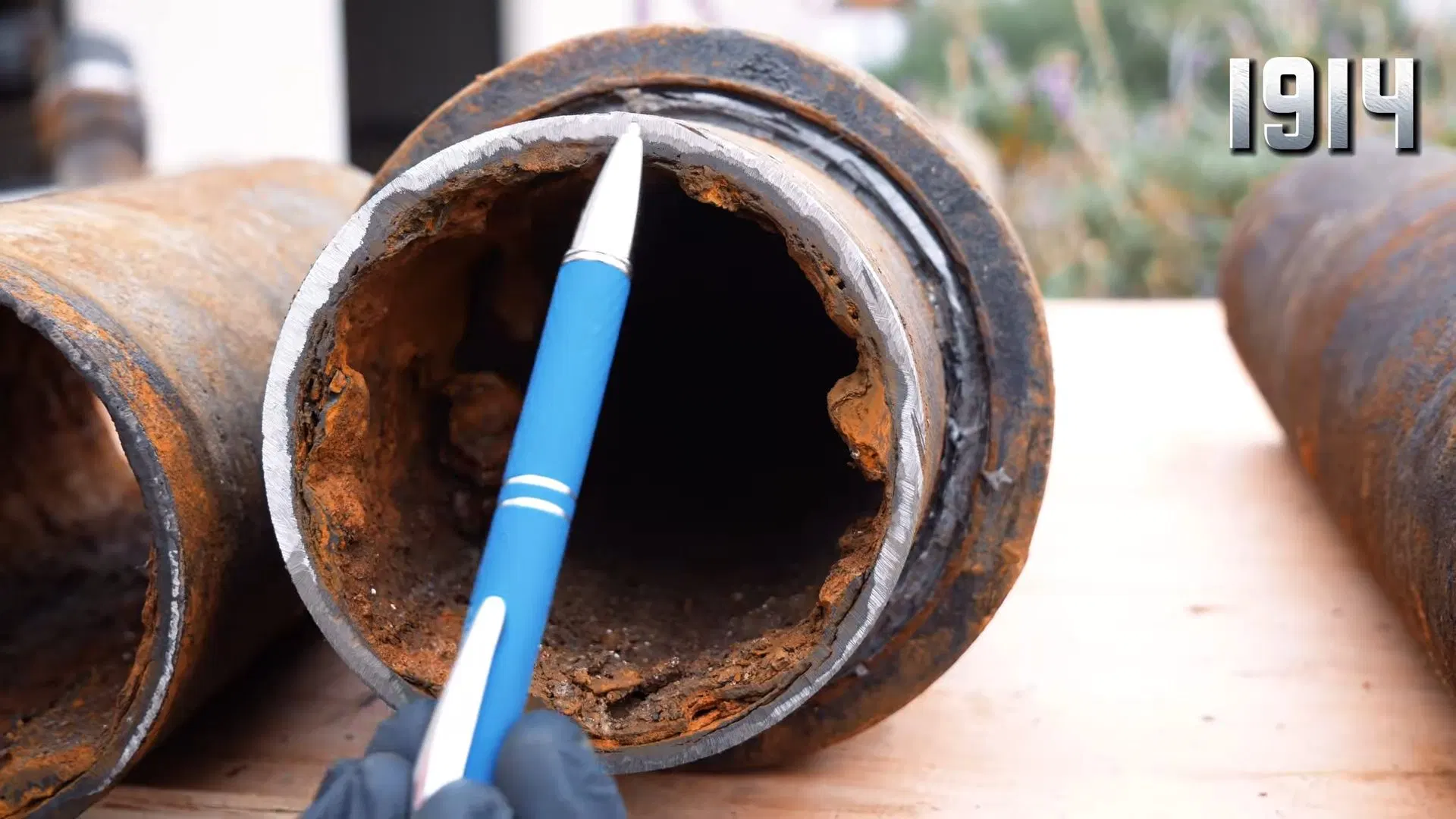 Cast Iron Pipe Interior With Blue Sample shown for Plumber in Hiram, GA in Hiram, Georgia.