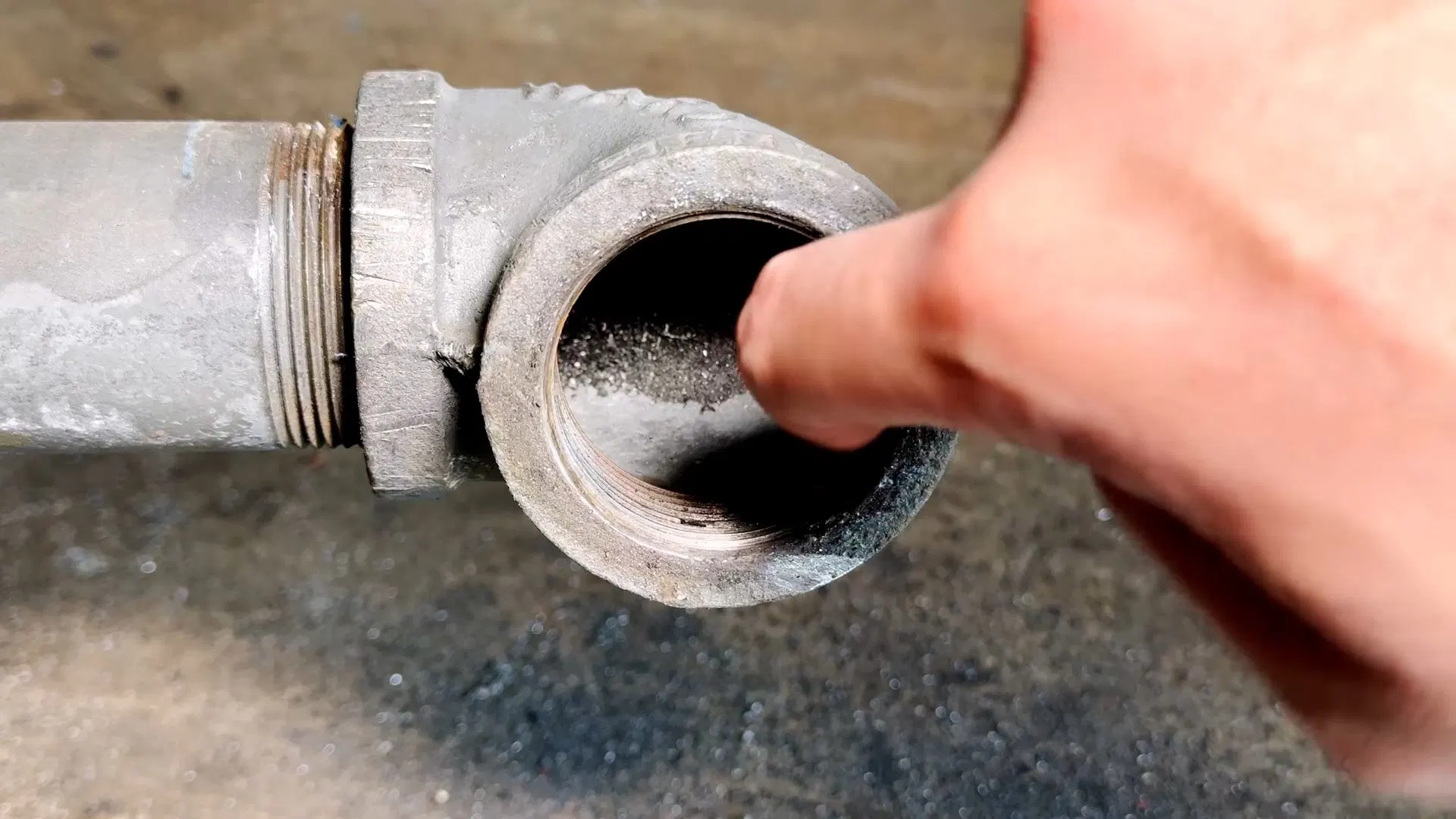Closeup Of Old Cast Iron Cleanout Opening shown for Areas we serve near Dallas, GA in Dallas, Georgia.