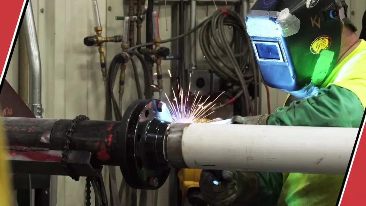 Commercial Plumber Cutting Large Metal Pipe shown for Plumber in Dallas, GA in Dallas, Georgia.