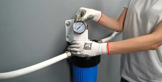 Connecting Water Lines To Filter Housing shown for City Water or Well Water: What Actually Needs Filtering in Paulding County? in Dallas, Georgia.