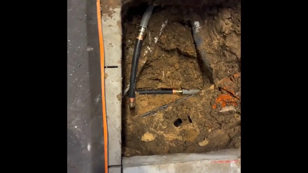Copper Water Pipe In Open Floor Trench shown for How Many Pinhole Leaks Before a Dallas, GA Home Needs a Full Repipe? in Dallas, Georgia.