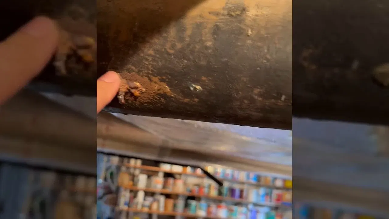 Corroded Cast Iron Pipe Inside Crawlspace shown for Plumbing services in Dallas, GA in Dallas, Georgia.