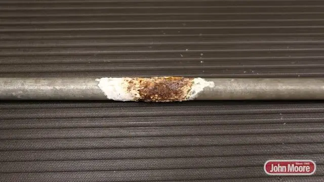 Corrosion Spot On Galvanized Water Pipe shown for Water Bill Spike in Dallas, GA: Is It a Leak? in Dallas, Georgia.