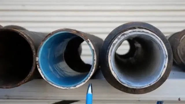 Cutting Old Cast Iron Pipe Outdoors shown for Plumbing guides for Dallas and Paulding County in Dallas, Georgia.