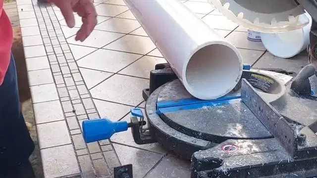 Cutting White PVC Pipe On Workbench shown for Plumbing guides for Dallas and Paulding County in Dallas, Georgia.