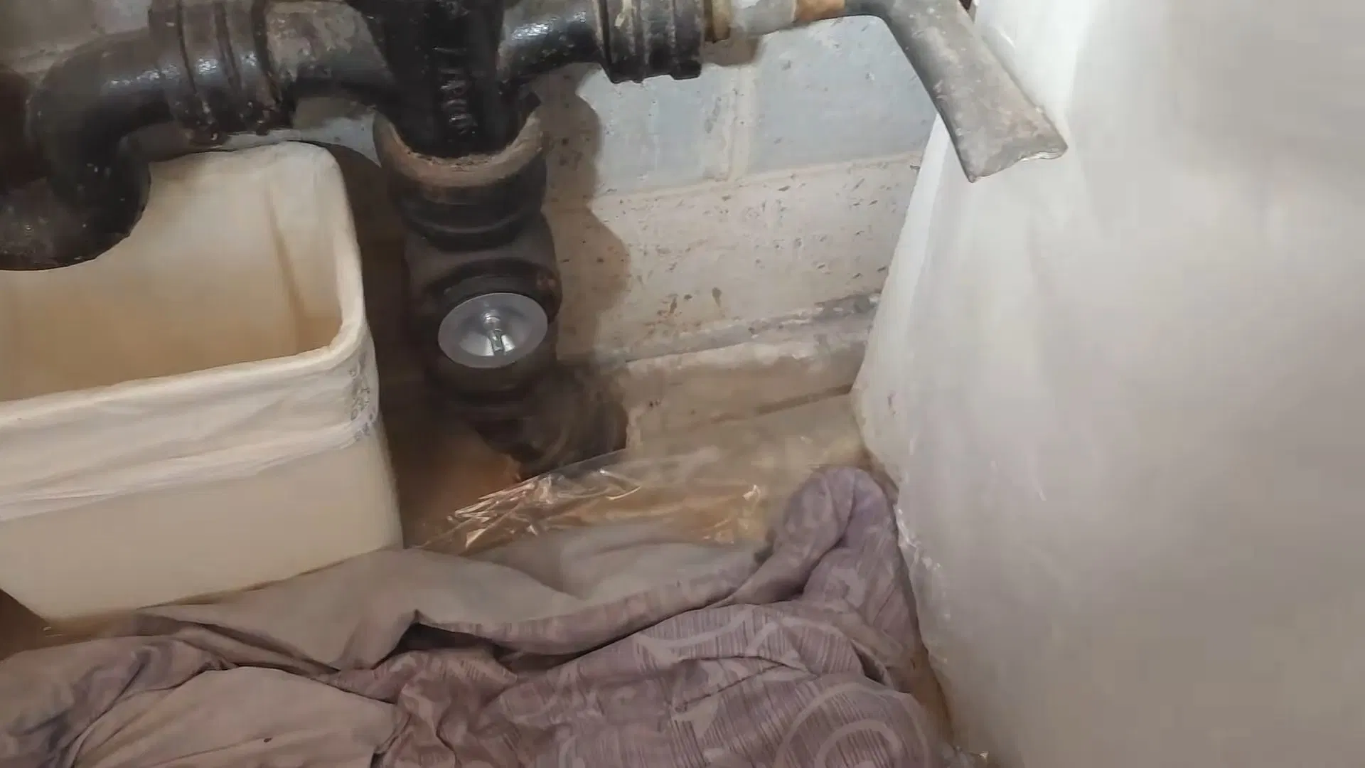Damaged Cast Iron Drain At Bathroom Floor shown for Drain Cleaning in Dallas, GA in Dallas, Georgia.