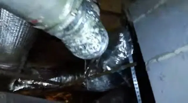 Damaged Crawlspace Metal Pipe Close Up shown for Plumber in Dallas, GA in Dallas, Georgia.