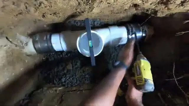Drilling PVC Sewer Wye In Trench shown for Areas we serve near Dallas, GA in Dallas, Georgia.