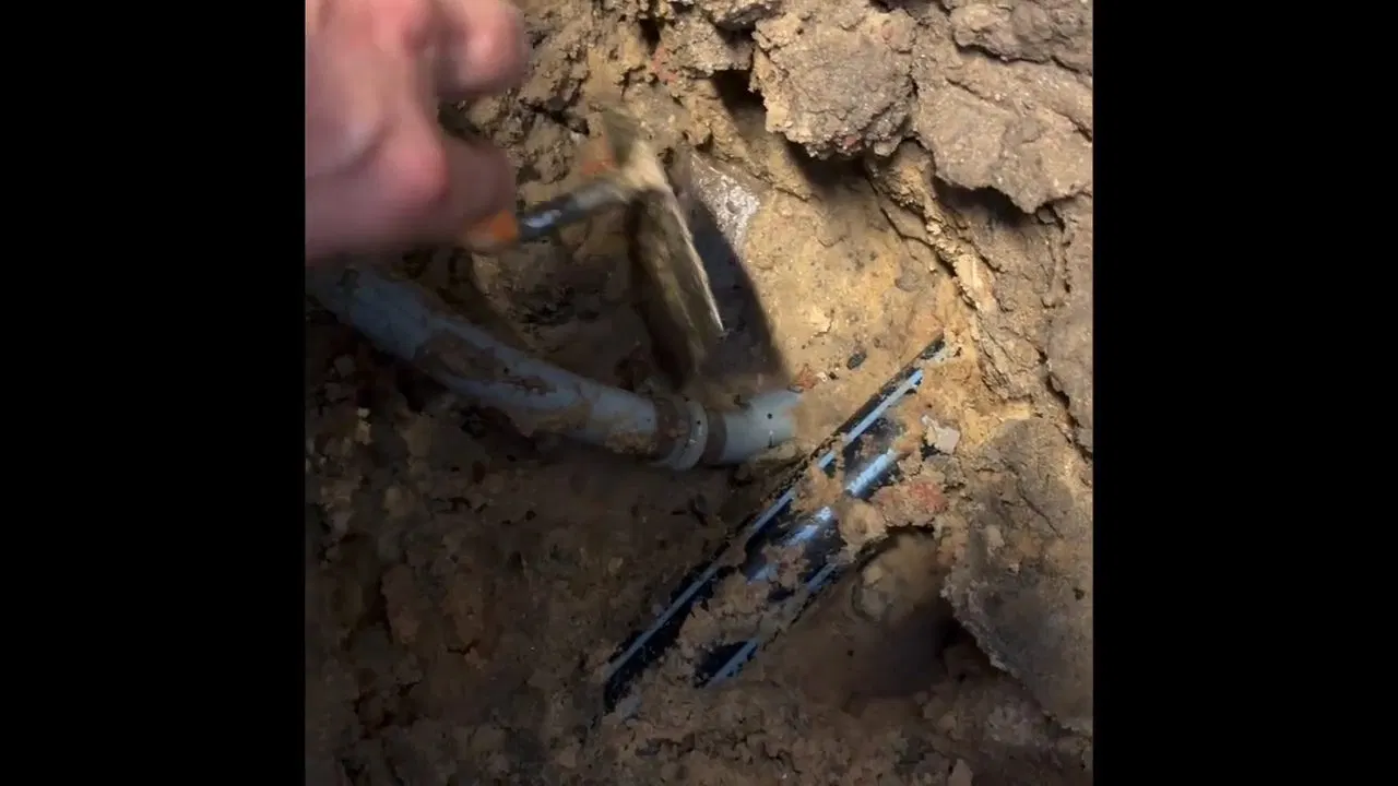 Exposed Copper Pipe Beneath Concrete shown for How Many Pinhole Leaks Before a Dallas, GA Home Needs a Full Repipe? in Dallas, Georgia.