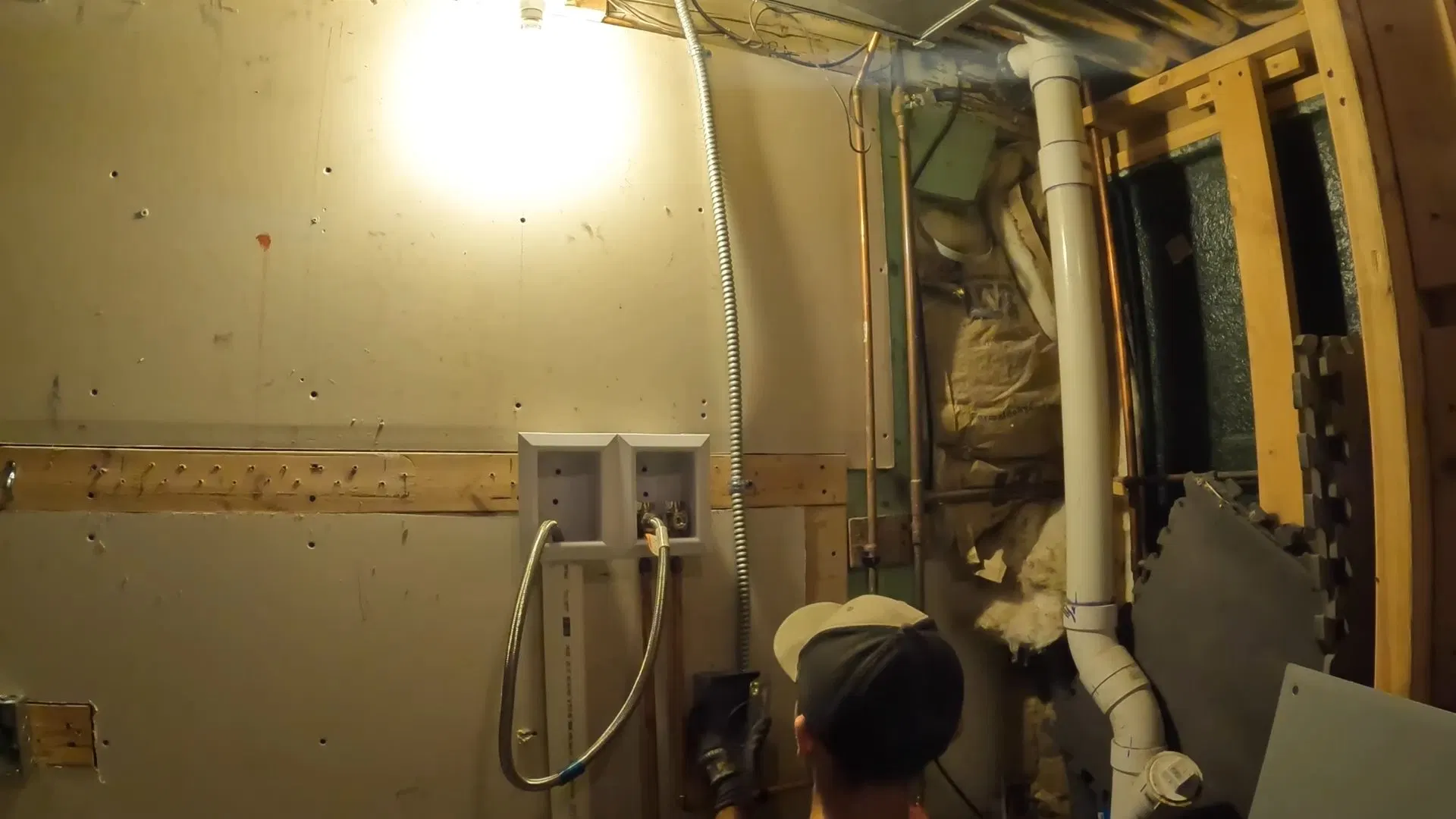 Framed Basement Laundry Pipe Installation shown for Plumber in Dallas, GA in Dallas, Georgia.