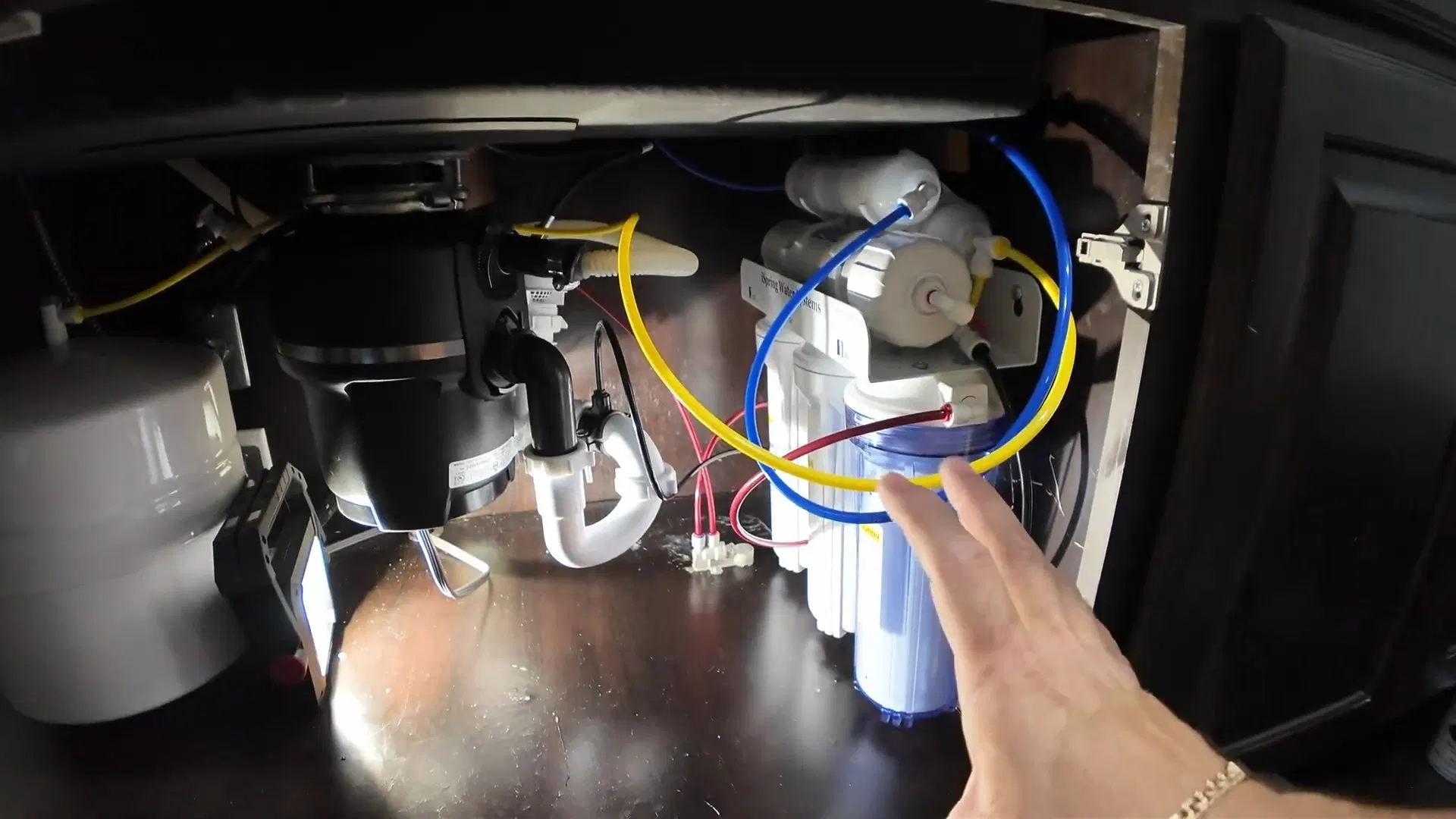 Garbage Disposal Wiring Inside Sink Cabinet shown for Garbage Disposal Repair & Installation in Dallas, GA in Dallas, Georgia.