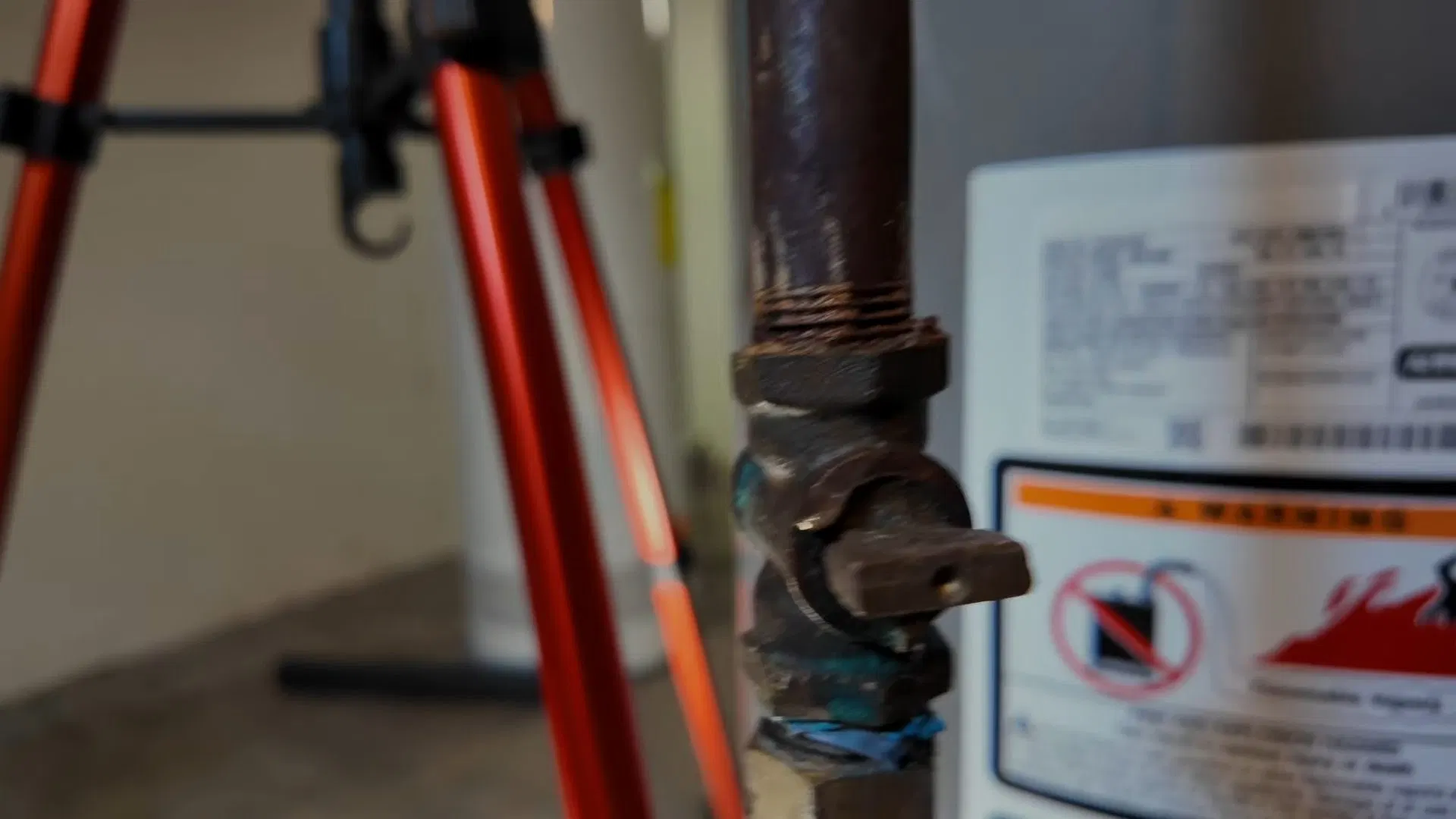 Gas Shutoff Valve Beside Water Heater shown for Gas Line Installation & Repair in Dallas, GA in Dallas, Georgia.