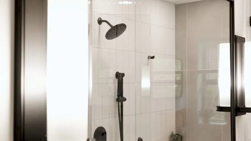 Glass Shower Enclosure In Modern Bathroom shown for What Size Water Heater Does a Dallas, GA Household Actually Need? in Dallas, Georgia.