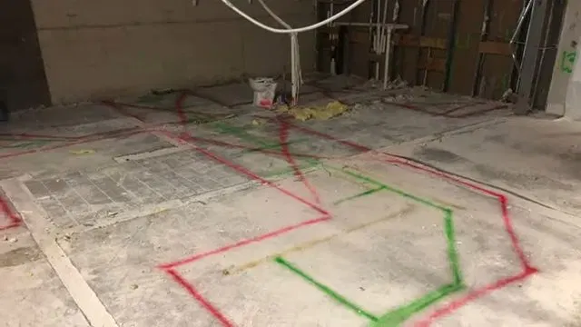 Marked Concrete Floor For Restroom Plumbing Layout shown for Commercial Plumbing in Dallas, GA in Dallas, Georgia.