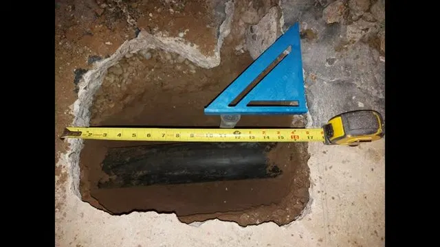 Measuring Basement Slab Opening For Bathroom Drain shown for Should a Dallas, GA Home on Septic Even Have a Garbage Disposal? in Dallas, Georgia.