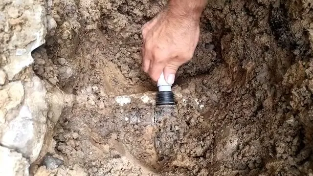 Measuring Short PEX Water Line Repair Piece shown for Slab Leak Detection & Repair in Dallas, GA in Dallas, Georgia.