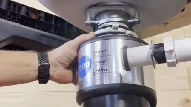 Mounting New Garbage Disposal Under Sink shown for Garbage Disposal Repair & Installation in Dallas, GA in Dallas, Georgia.
