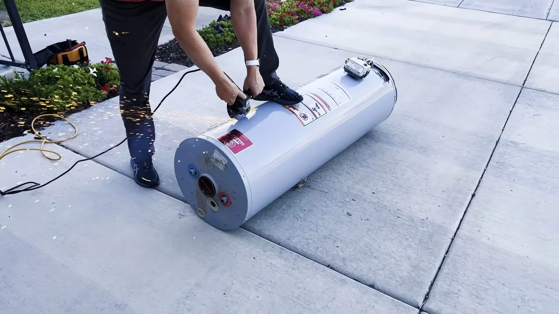 Moving Water Heater On Hand Truck shown for Water Heater Installation & Replacement in Dallas, GA in Dallas, Georgia.