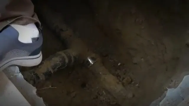 Old Sewer Line Exposed In Broken Slab shown for Sewer Line Repair & Replacement in Dallas, GA in Dallas, Georgia.