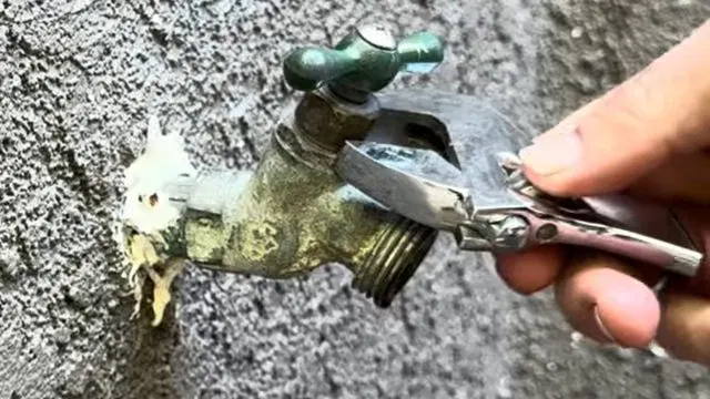 Opening Leaking Hose Bib To Diagnose Drip shown for Water Bill Spike in Dallas, GA: Is It a Leak? in Dallas, Georgia.