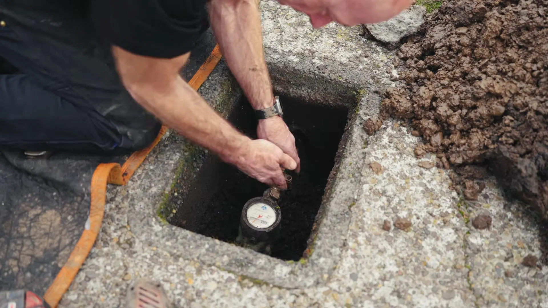 Opening Underground Water Service Access shown for Is Tankless Worth It for a Dallas, GA Home on Propane? in Dallas, Georgia.