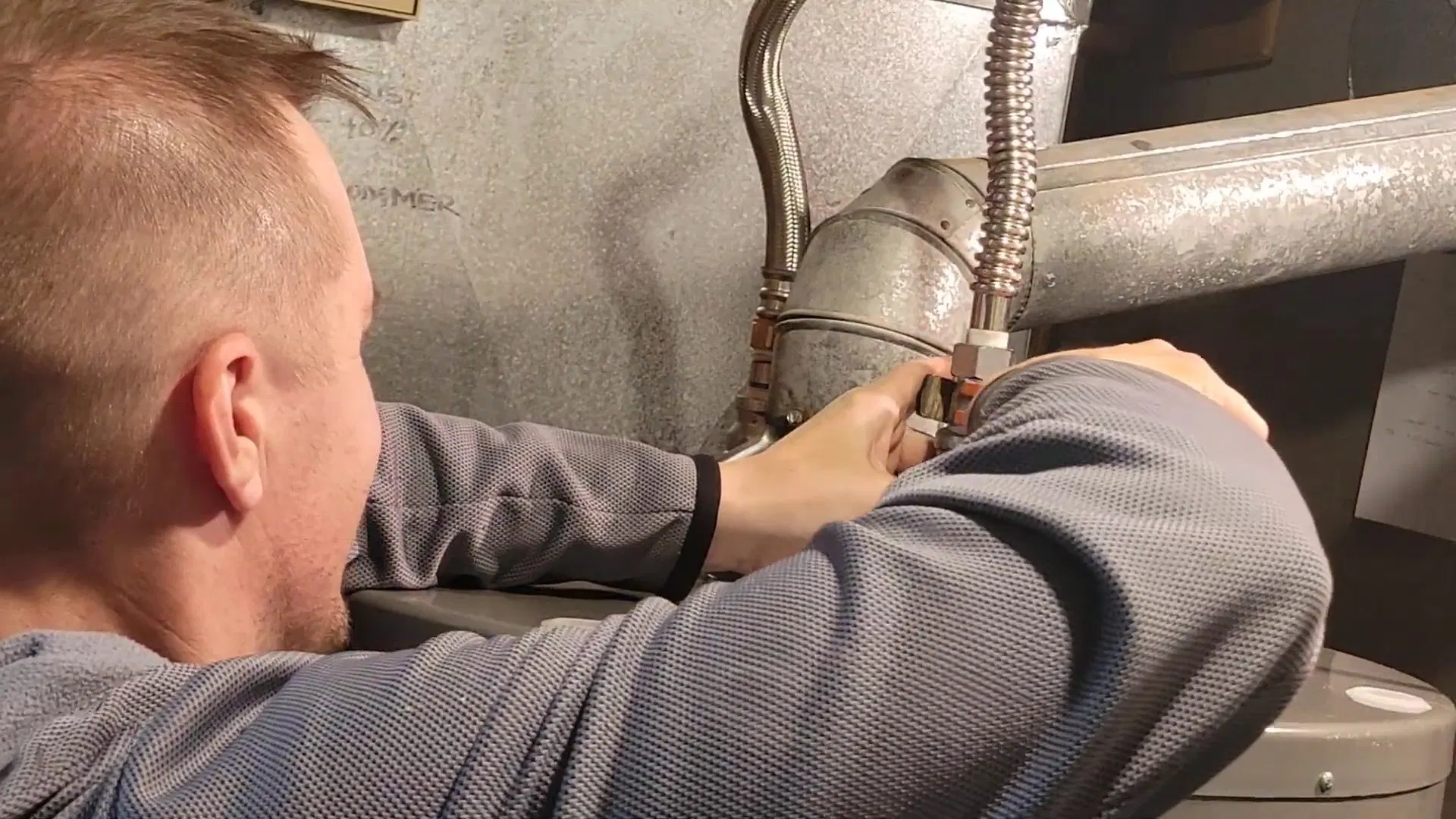 Plumber Connecting Water Heater Supply Line shown for Gas Line Installation & Repair in Dallas, GA in Dallas, Georgia.