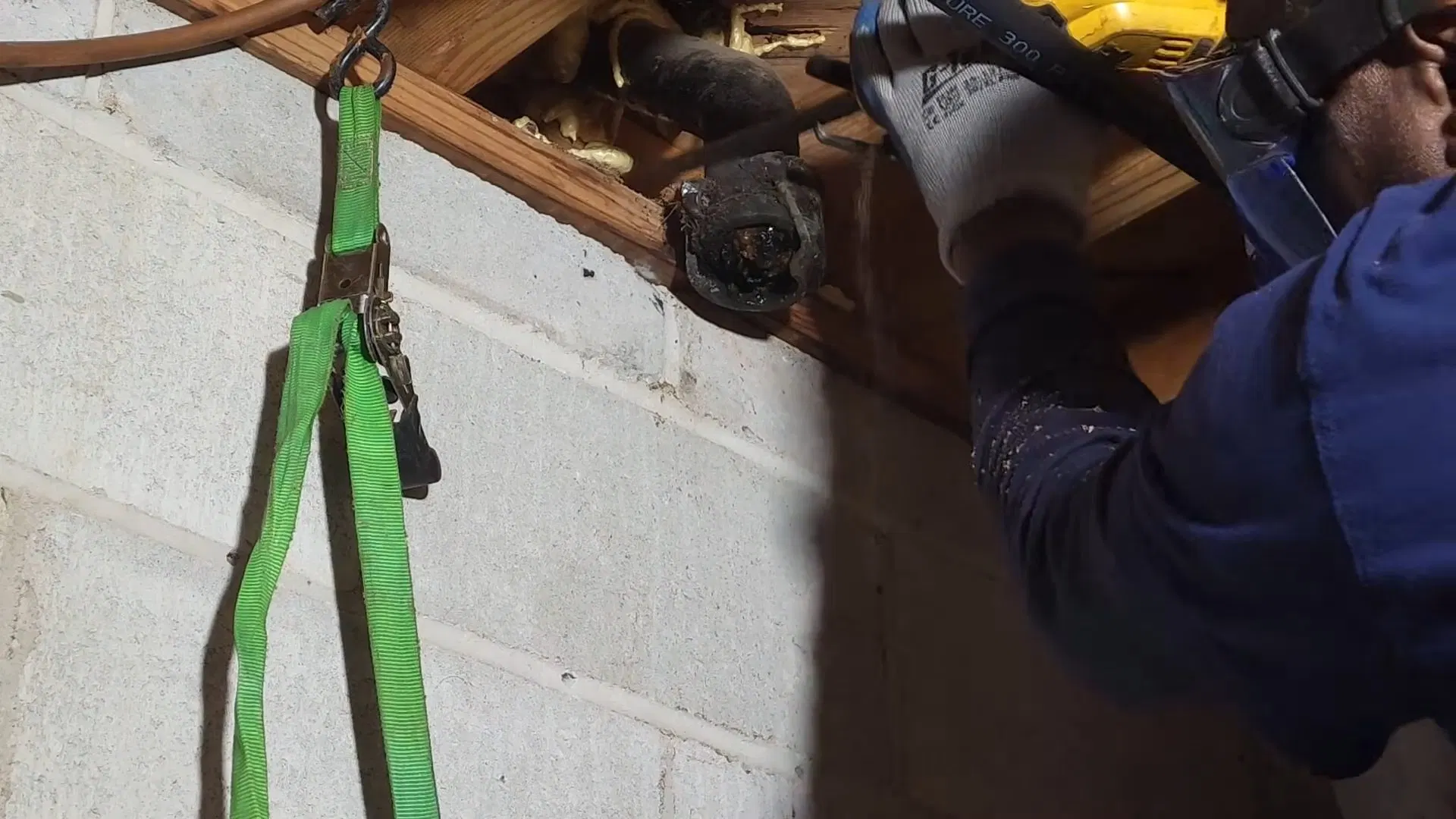 Plumber Cutting Exposed Cast Iron Pipe shown for Sewer Line Repair vs. Replacement: What Actually Decides It in Dallas, Georgia.