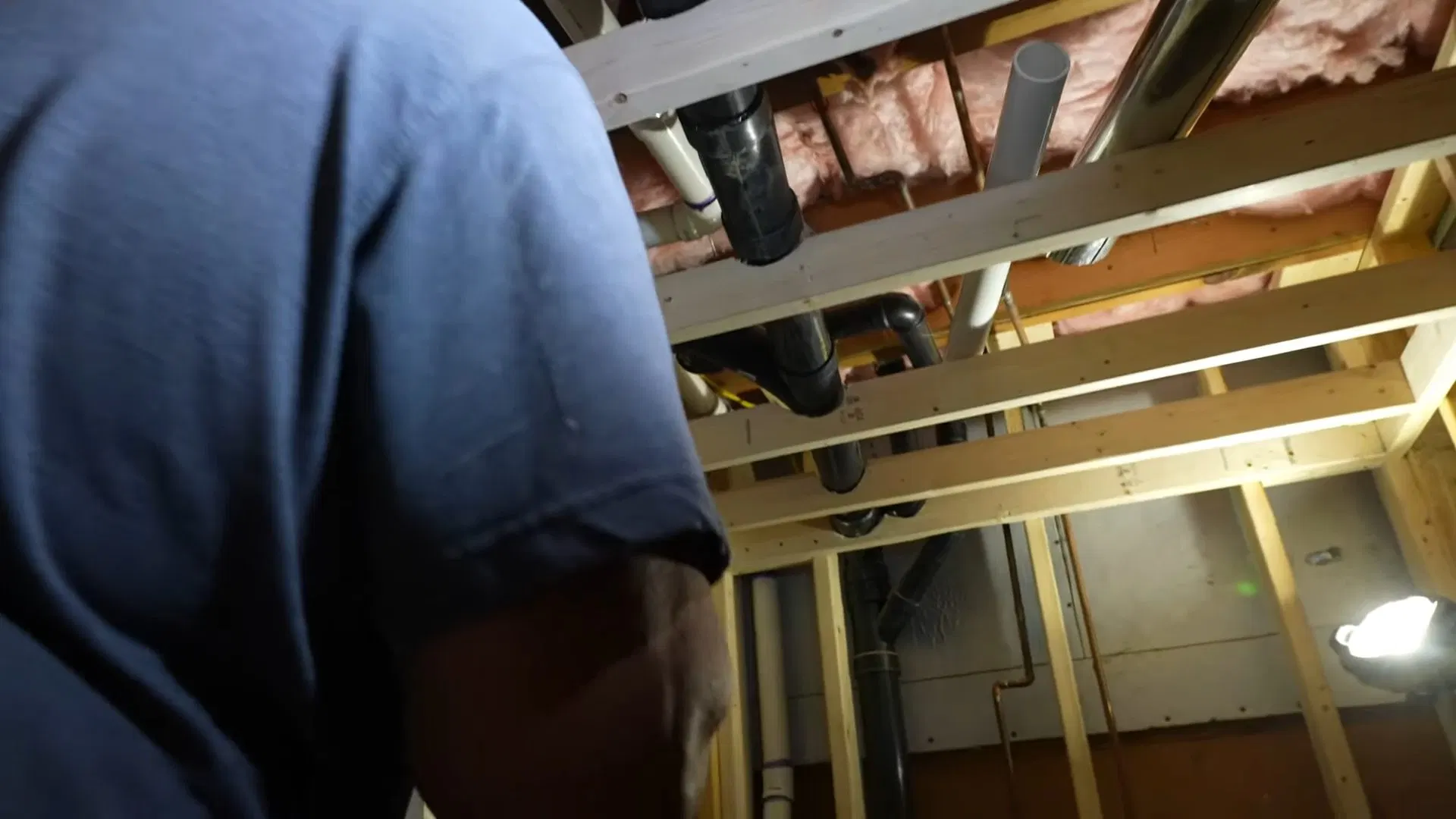 Plumber Installing Basement Vent Pipe shown for Is Tankless Worth It for a Dallas, GA Home on Propane? in Dallas, Georgia.