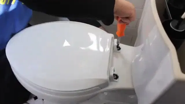 Plumber Working Beside Toilet During Remodel shown for Toilet Repair & Installation in Dallas, GA in Dallas, Georgia.