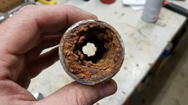 Plunging Clogged Toilet Bowl shown for Toilet Repair & Installation in Dallas, GA in Dallas, Georgia.