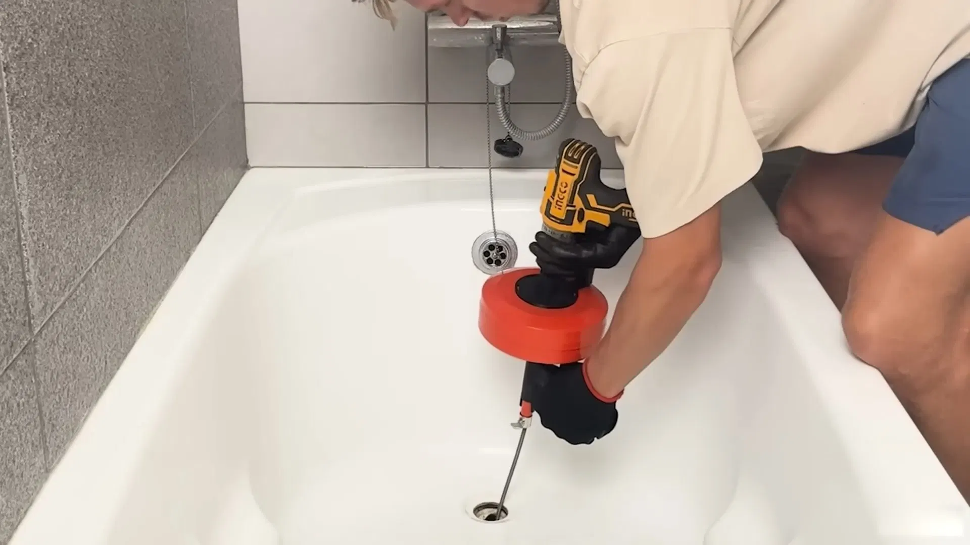 Power Drill Working On Bathtub Drain shown for Toilet Repair & Installation in Dallas, GA in Dallas, Georgia.