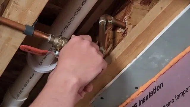 Press Connecting Copper Line In Basement Ceiling shown for How Many Pinhole Leaks Before a Dallas, GA Home Needs a Full Repipe? in Dallas, Georgia.