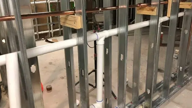 PVC Drain Lines Inside Metal Stud Wall shown for Should a Dallas, GA Home on Septic Even Have a Garbage Disposal? in Dallas, Georgia.