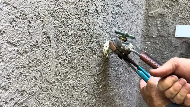 Reinstalling Hose Bib Stem Assembly shown for How Often Does a Septic Tank Actually Need Pumping in Paulding County? in Dallas, Georgia.