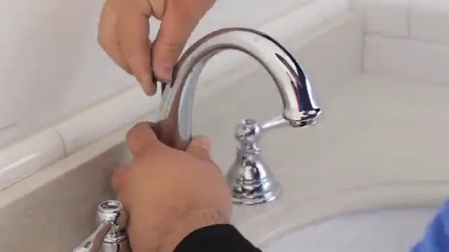 Removing Bathroom Faucet Handle shown for Faucet Repair & Installation in Dallas, GA in Dallas, Georgia.