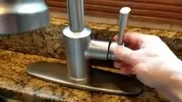 Removing Set Screw From Moen Faucet Handle shown for Why Does Our Faucet Keep Dripping After We Already Fixed It? in Dallas, Georgia.