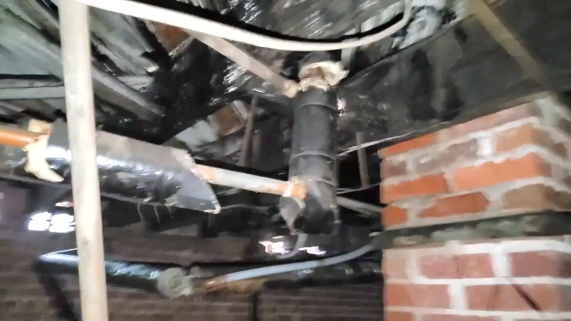 Rusty Leaking Crawlspace Plumbing Joint shown for The First Five Minutes of a Burst Pipe in a Dallas, GA Home in Dallas, Georgia.