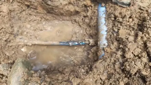 Searching For Leak In Flooded Excavation shown for Slab Leak Detection & Repair in Dallas, GA in Dallas, Georgia.