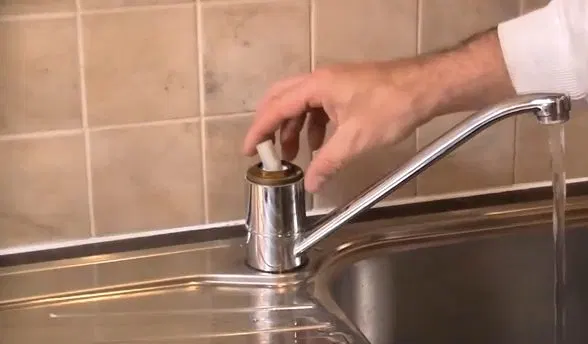 Seating Control Cap On Kitchen Faucet shown for Plumber in Dallas, GA in Dallas, Georgia.