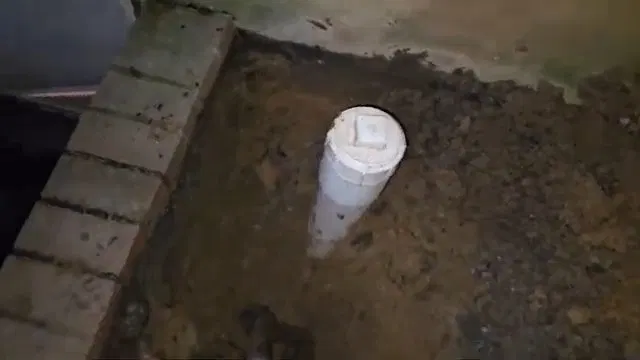 Sewer Cleanout Riser In Open Trench shown for Why Does Our Drain Keep Clogging Again After It's Been Snaked? in Dallas, Georgia.