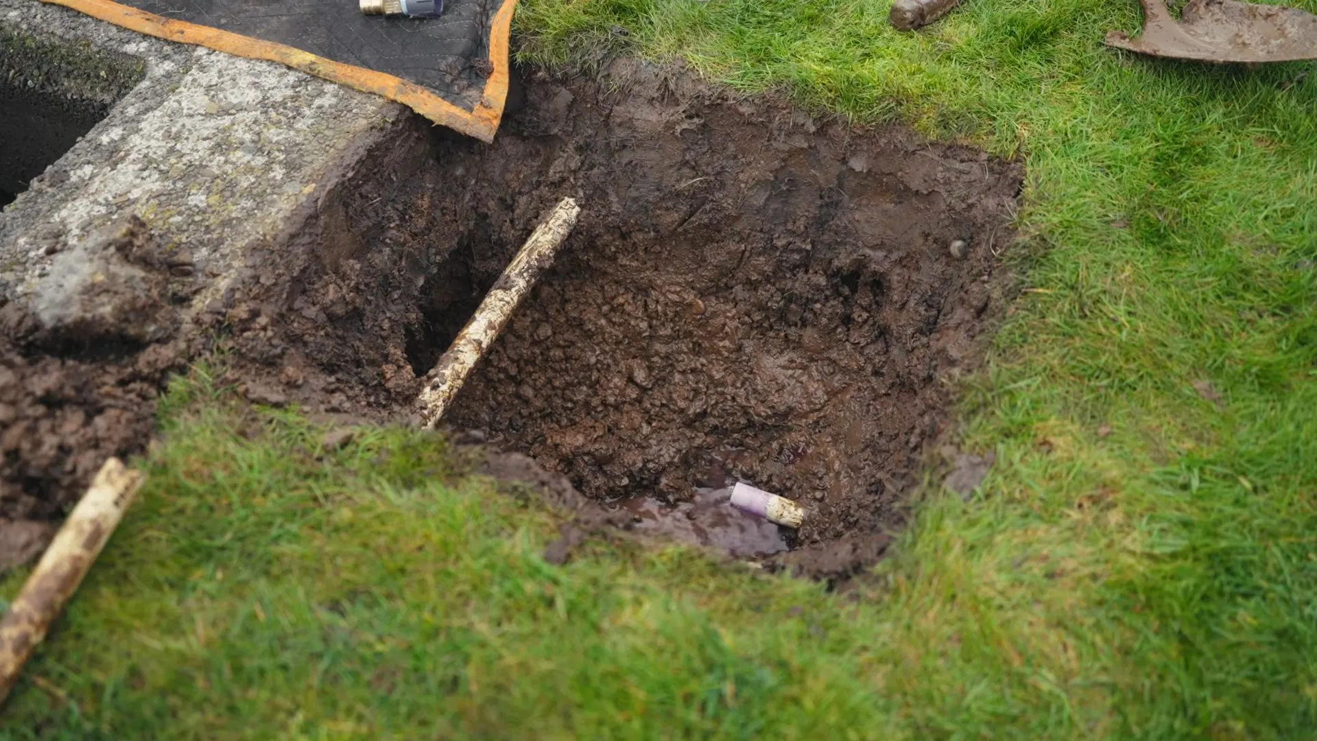 Shovel Beside Open Service Line Trench shown for How Often Does a Septic Tank Actually Need Pumping in Paulding County? in Dallas, Georgia.