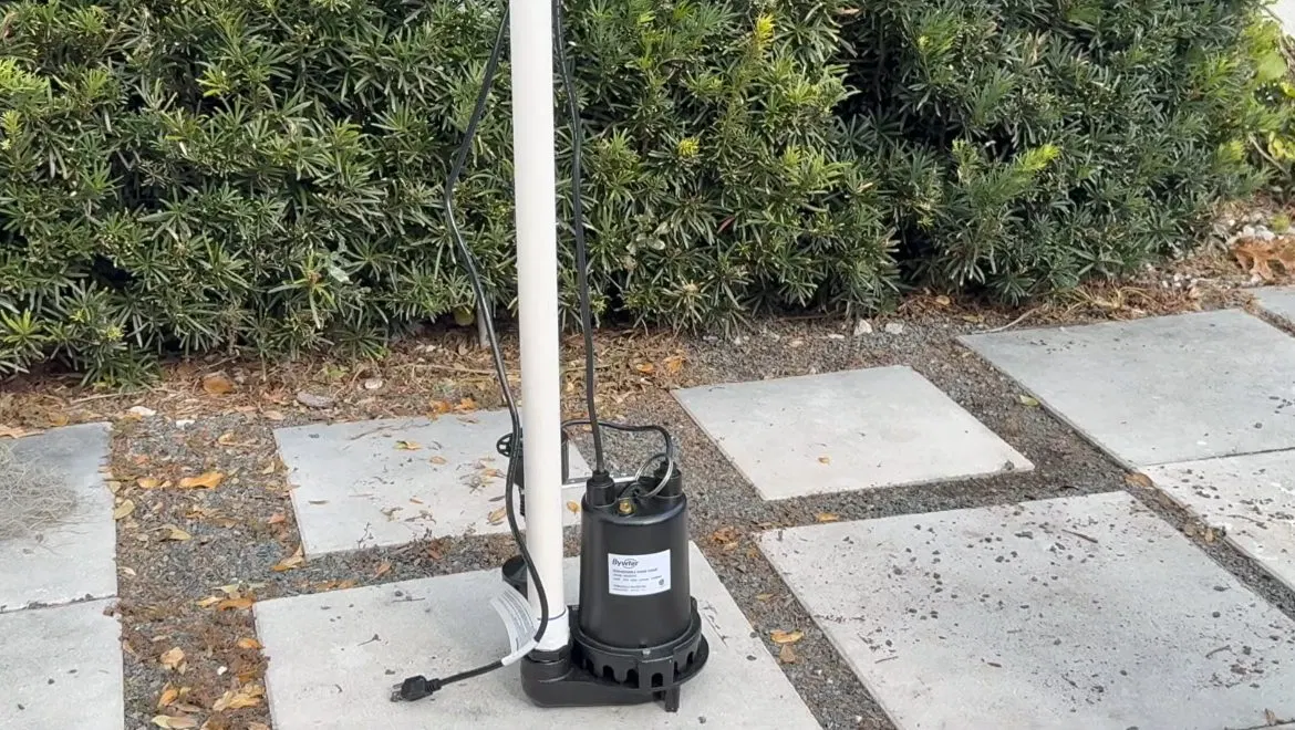 Sump Pump Discharge Outside House shown for Contact Plumbing Pros Dallas GA in Dallas, Georgia.