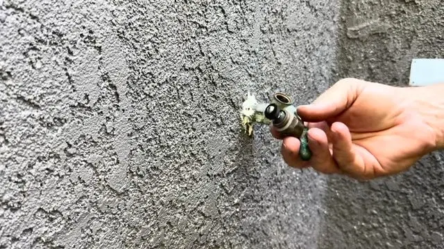 Tightening Washer Screw On Valve Stem shown for How Often Does a Septic Tank Actually Need Pumping in Paulding County? in Dallas, Georgia.