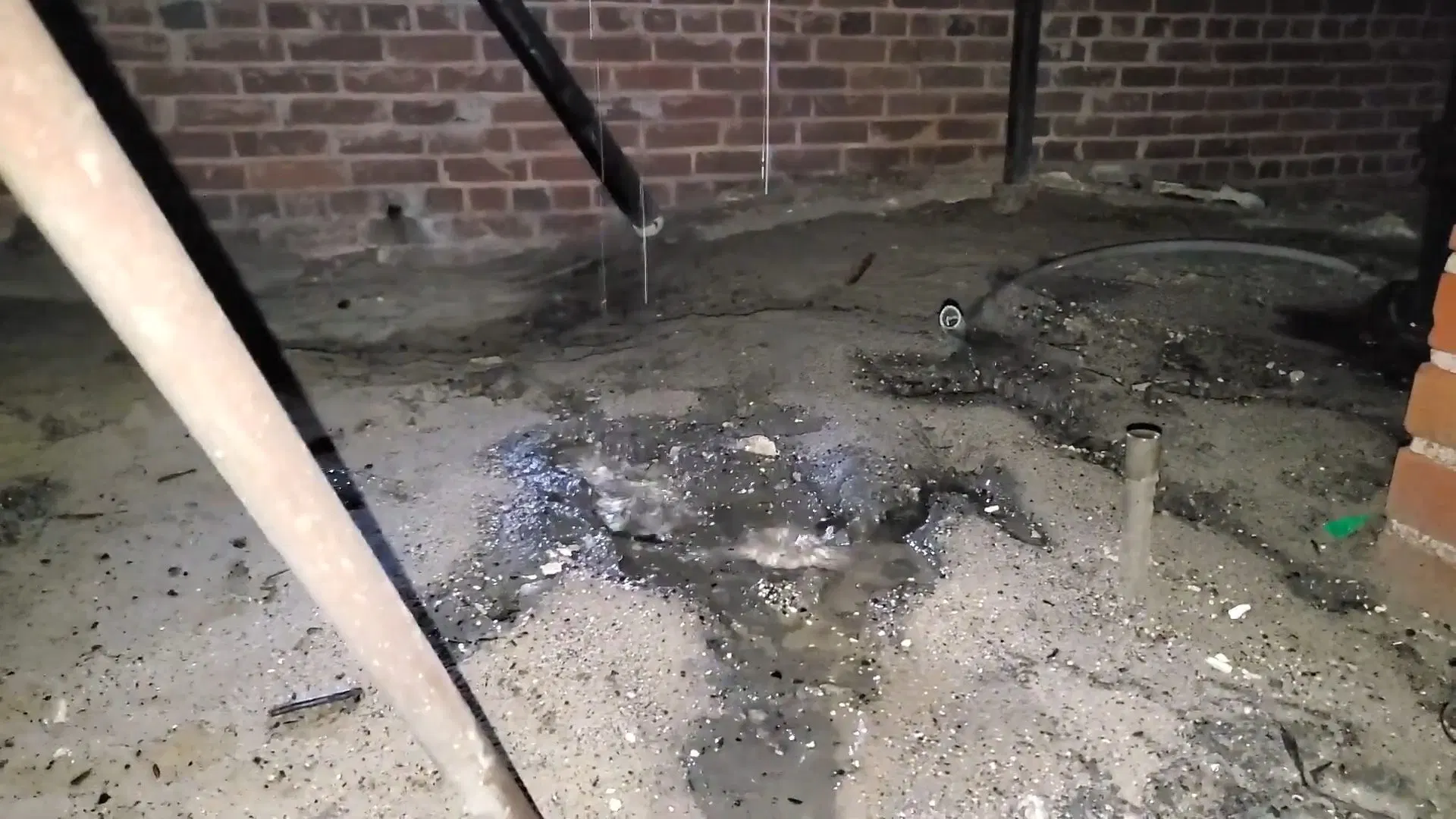 Wet Ground Under Leaking Crawlspace Pipe shown for Repiping in Dallas, GA in Dallas, Georgia.