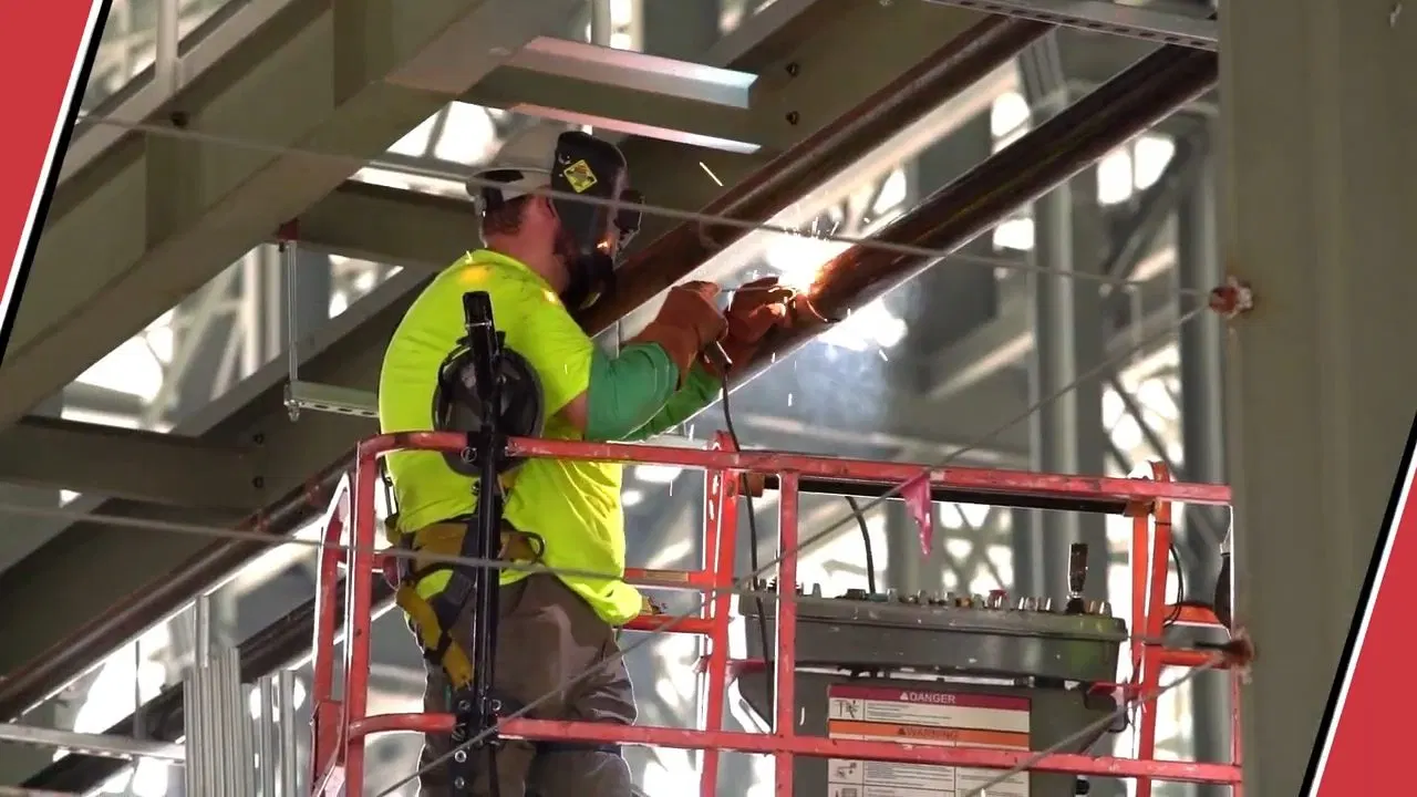 Workers Installing Commercial Building Pipes shown for Plumbing services in Dallas, GA in Dallas, Georgia.