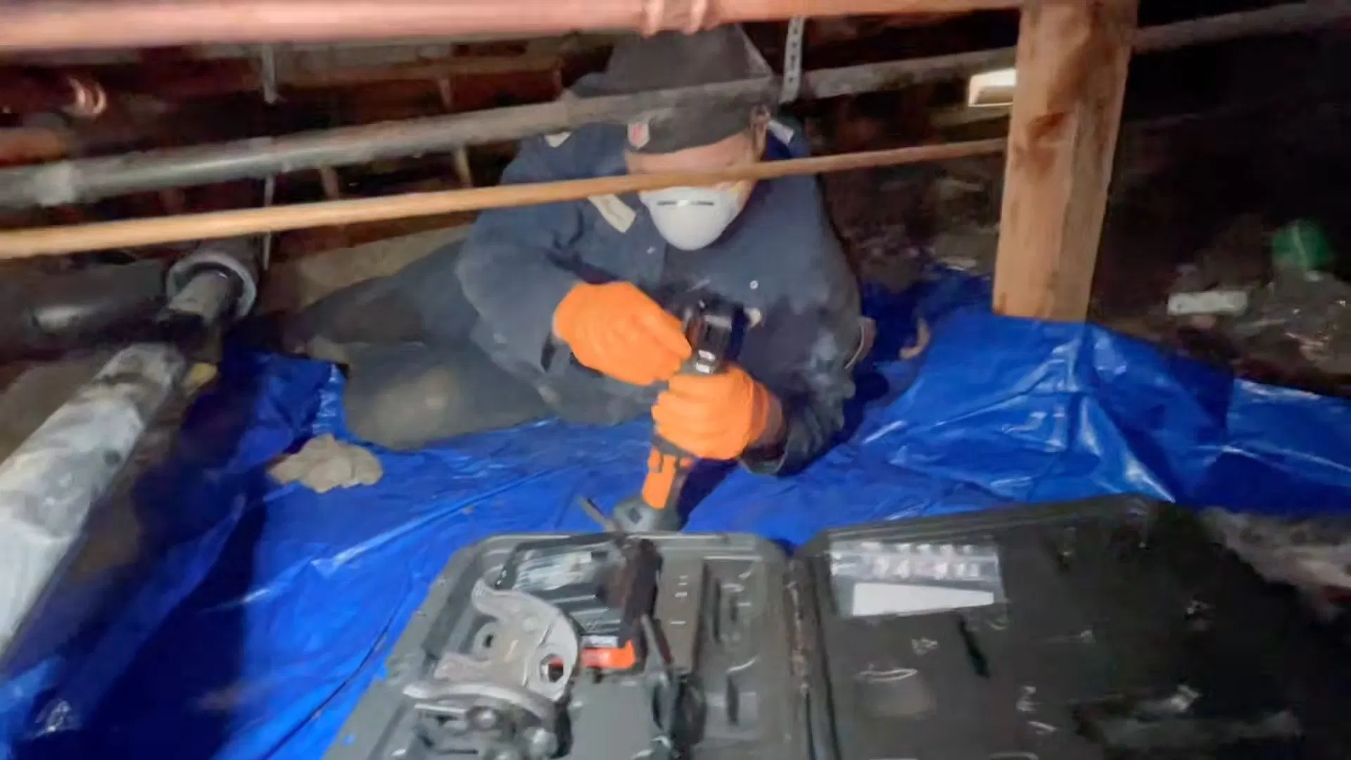 Workers Repairing Leaking Crawlspace Pipe shown for Repiping in Dallas, GA in Dallas, Georgia.